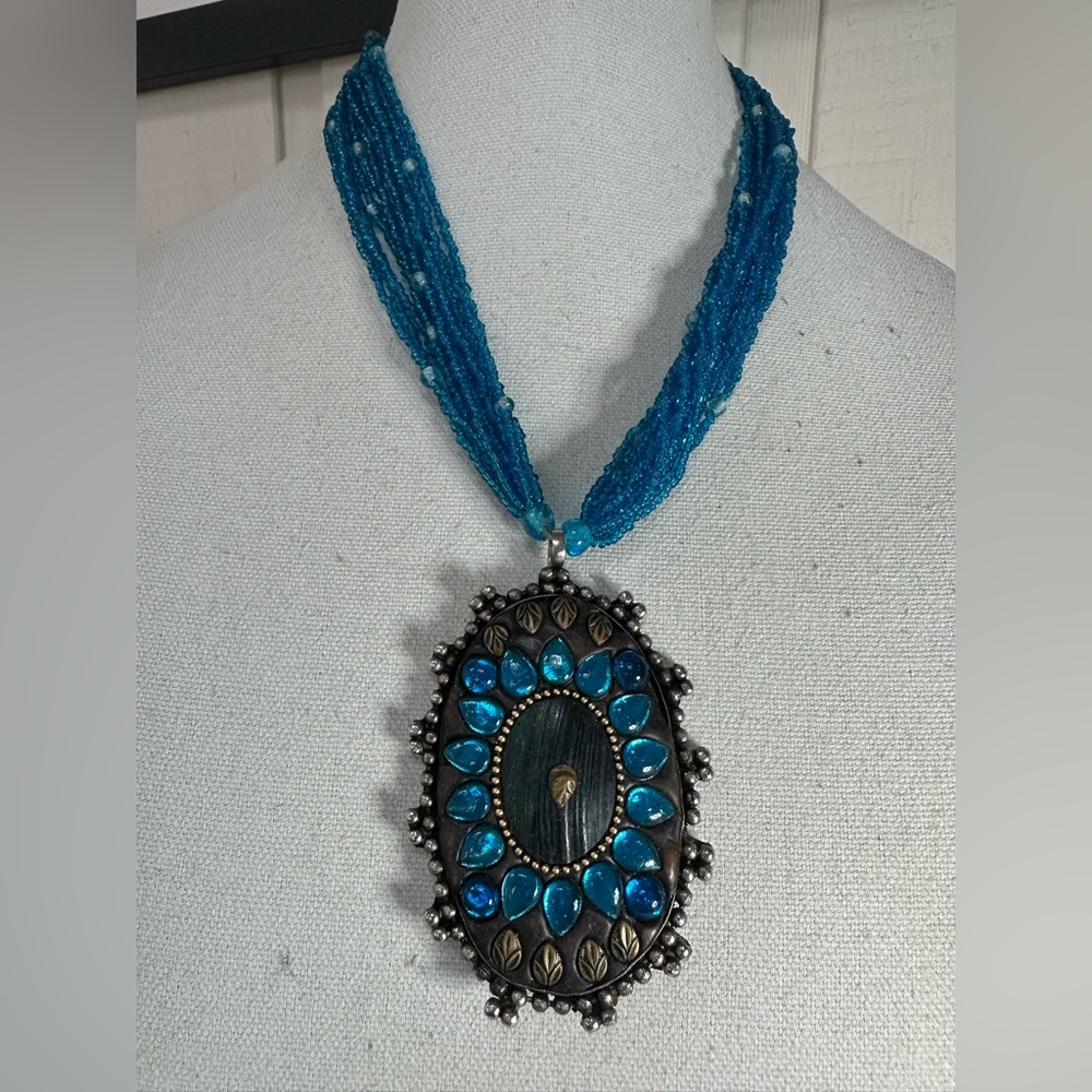 Gorgeous blue seed bead necklace with large oval medallion